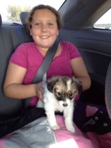 Aurora holding Romeo on 10/13/13, shortly after we adopted him! 